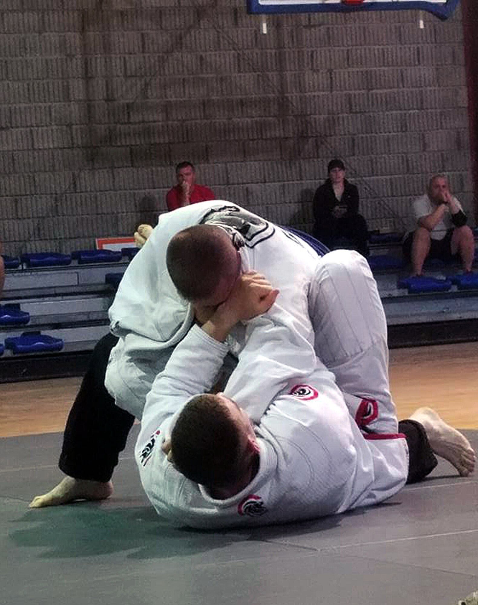 Base personnel compete in a Jiu-Jjitsu tournament at Al Udeid Air Base, Qatar, Dec. 7, 2016. The Jiu-Jitsu practitioners took time to come together and commemorate the 75th anniversary of the Pearl Harbor attack with a showcase of physical discipline. (Courtesy Photo)