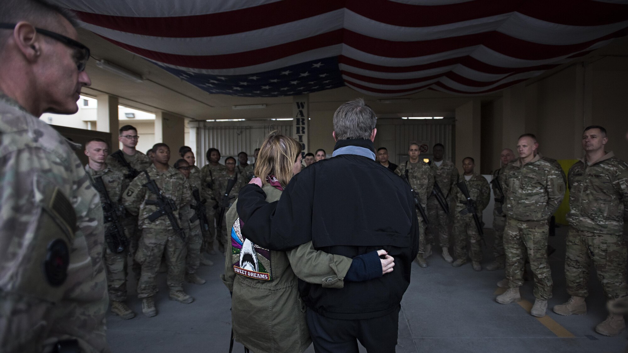 Defense Secretary Ash Carter and his wife, Stephanie, address service members at the Craig Joint Theater Hospital Dec. 9, 2016 at Bagram Airfield, Afghanistan. Carter thanked members of Task Force – Medical for their casualty response efforts after a recent suicide bombing here. (U.S. Air Force photo by Staff Sgt. Katherine Spessa)