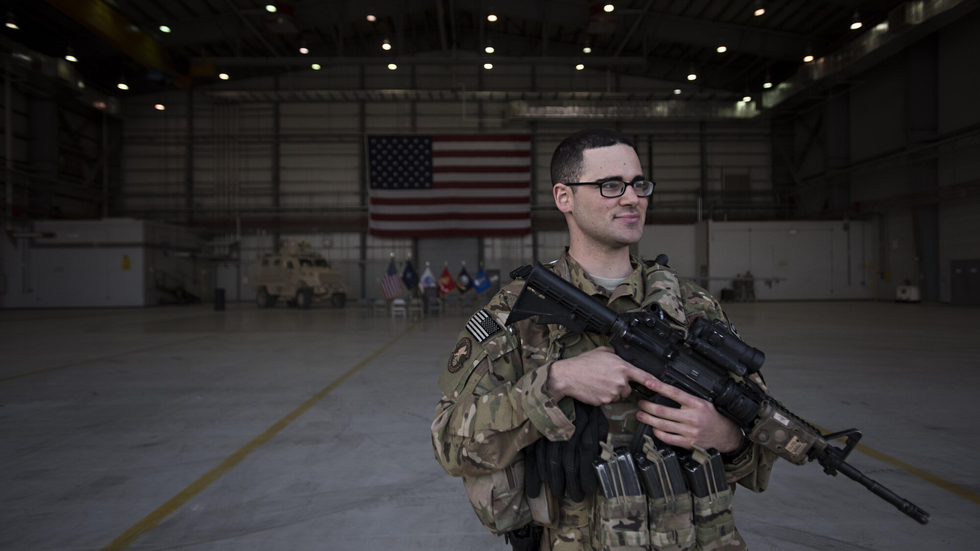 Staff Sgt. Gino Runco, 455th Expeditionary Security Forces Squadron fly away security team member, stands guard before Secretary of Defense Ash Carter gives a press conference Dec. 9, 2016 at Bagram Airfield, Afghanistan. Carter visited Bagram as part of his holiday tour Defense Department bases around the world. (U.S. Air Force photo by Staff Sgt. Katherine Spessa)