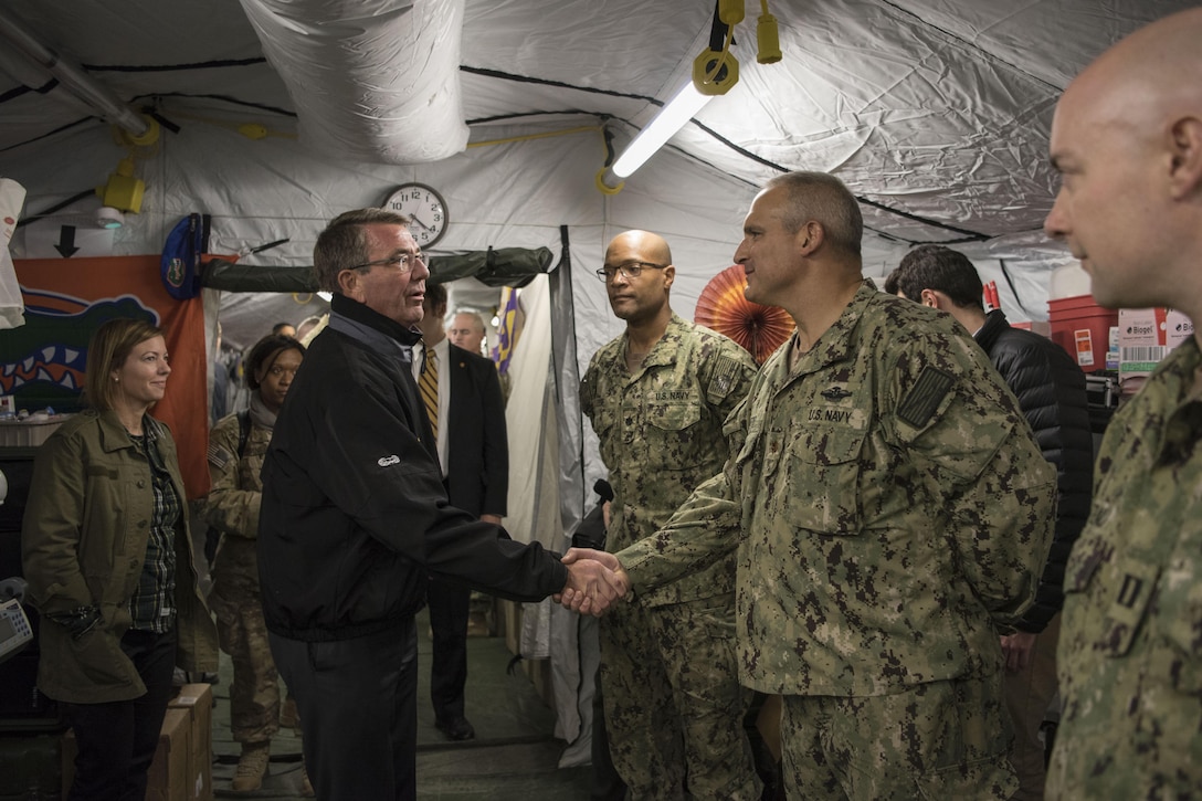 Defense Secretary Ash Carter shakes hands with troops serving at Qayyarah Airfield West, Iraq.