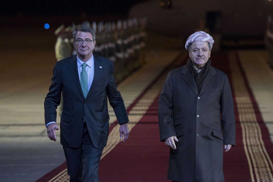 Defense Secretary Ash Carter and Masoud Barzani, president of the Iraqi Kurdistan Region, walk together before discussing matters of mutual importance in Irbil, Iraq.