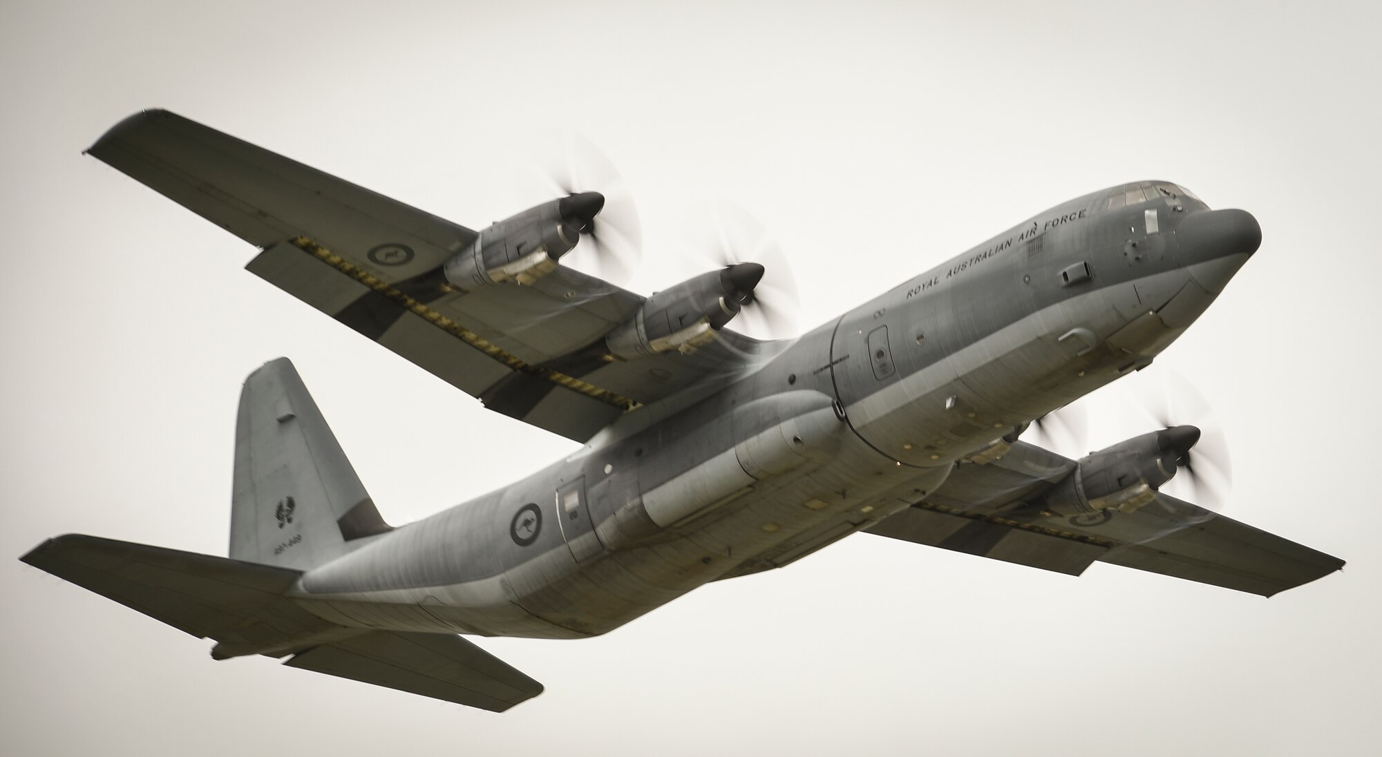 A C-130J Super Hercules with the Royal Austrailian Air Force takes off during Operation Christmas Drop at Andersen Air Force Base, Guam, Dec. 7, 2016. C-130 Hercules air crews and maintainers came to Andersen from the U.S. Air Force, the Japan Self Defense Force and RAAF to train together by delivering 140 parachute bundles of donated supplies to the Micronesian Islands. (U.S. Air Force photo by Senior Airman Elizabeth Baker/Released)