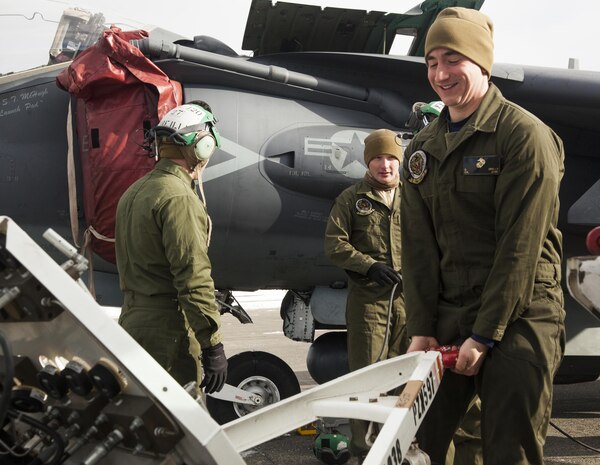 U.S. Marines with Marine Attack Squadron (VMA) 542 conduct routine inspections and maintenance on the AV-8B Harriers during the Aviation Training Relocation Program at Chitose Air Base, Japan, Dec. 7, 2016. VMA-542 is conducting training with their harriers at Chitose Air Base in an effort to increase operational readiness between the U.S. Marine Corps and the Japan Air Self Defense Force, improve interoperability and reduce noise concerns of aviation training on local communities by disseminating training locations throughout Japan. (U.S. Marine Corps photo by Cpl. James A. Guillory)