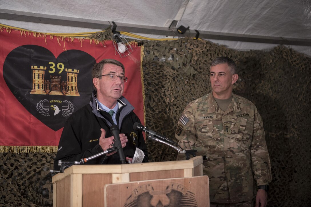 Defense Secretary Ash Carter and Army Lt. Gen. Stephen Townsend, commander of Combined Joint Task Force Operation Inherent Resolve, host a joint press conference at Qayyarah Airfield West, Iraq, Dec. 11, 2016. DOD photo by Air Force Tech. Sgt. Brigitte N. Brantley