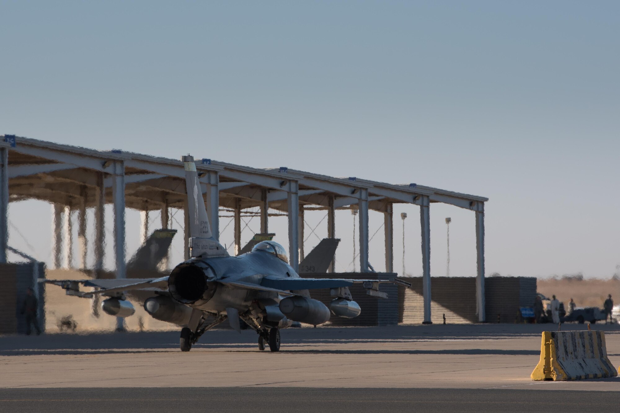An F-16 Fighting Falcon assigned to the 134th Expeditionary Fighter Squadron taxis onto the ramp at the 407th Air Expeditionary Group, Southwest Asia, Dec. 10, 2016. The F-16 squadron is comprised of Airmen from the 158th Fighter Wing of the Vermont Air National Guard. (U.S. Air Force photo by Master Sgt. Benjamin Wilson)