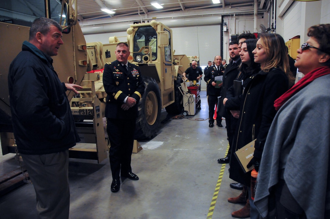 Maj. Gen. Troy D. Kok, commanding general of the Army Reserve’s 99th Regional Support Command, tours an Army Reserve maintenance facility following a capabilities briefing for federal congressional staff members Dec. 9 at the Maj. Gen. Maurice Rose Armed Forces Reserve Center in Middletown, Connecticut. Kok hosted the event in order to help the congressional members understand the Army Reserve’s unique roles and capabilities, to include support to civil authorities in response to natural disasters.