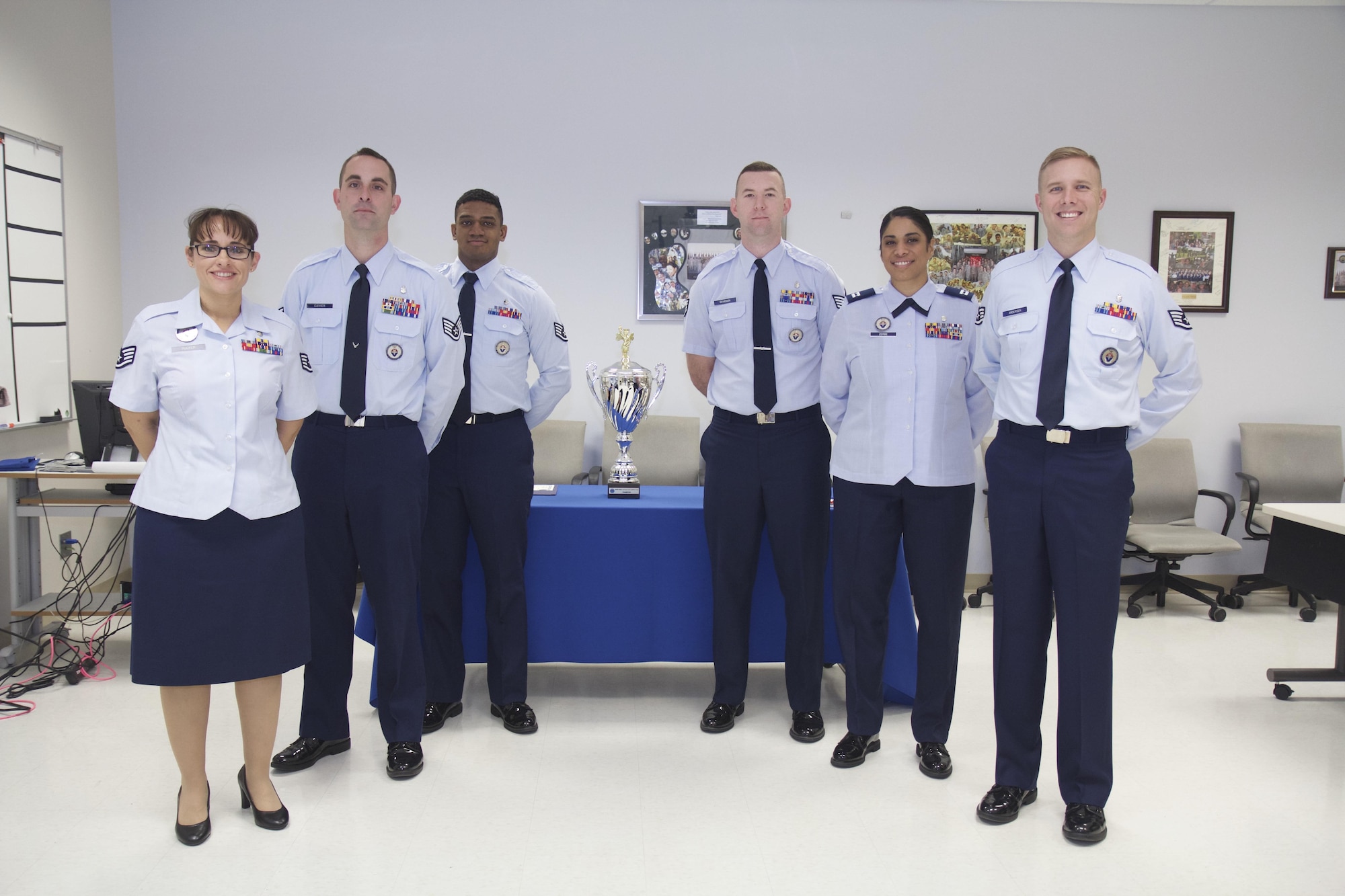 Two teams participated in the third annual SAM-Tastic instructional excellence competition at the 711th Human Performance Wing's U.S. Air Force School of Aerospace Medicine. Left to right are: Staff Sgt. Christopher Cameron, Staff Sgt. Jonathan Cavier and Staff Sgt. Barbara Rucker, USAFSAM Occupational and Environmental Health Department instructors, and Staff Sgt. Jeremy Davidson, Capt. Jessica Zerbe and Staff Sgt. Joshua Andersen, USAFSAM Public Health and Preventive Medicine Department instructors. (U. S. Air Force photo/David Snedigar)
