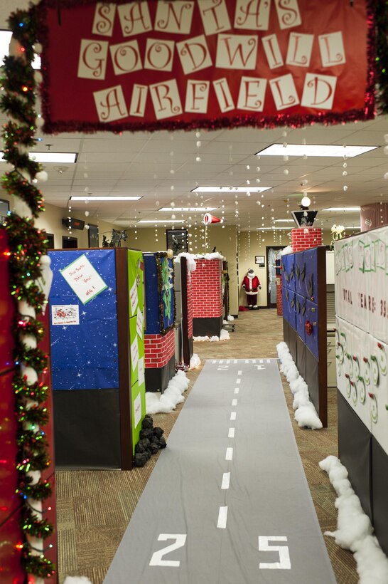 The U.S. Army Reserve Command Aviation Directorate decorated their area as Santa's Goodwill Airfield during the USARC Holiday Open House and Tree Lighting ceremony, Dec. 9, 2016. USARC Soldiers and civilians took time out to celebrate the season and fellowship with each other. (U.S. Army photo by Timothy L. Hale/Released)