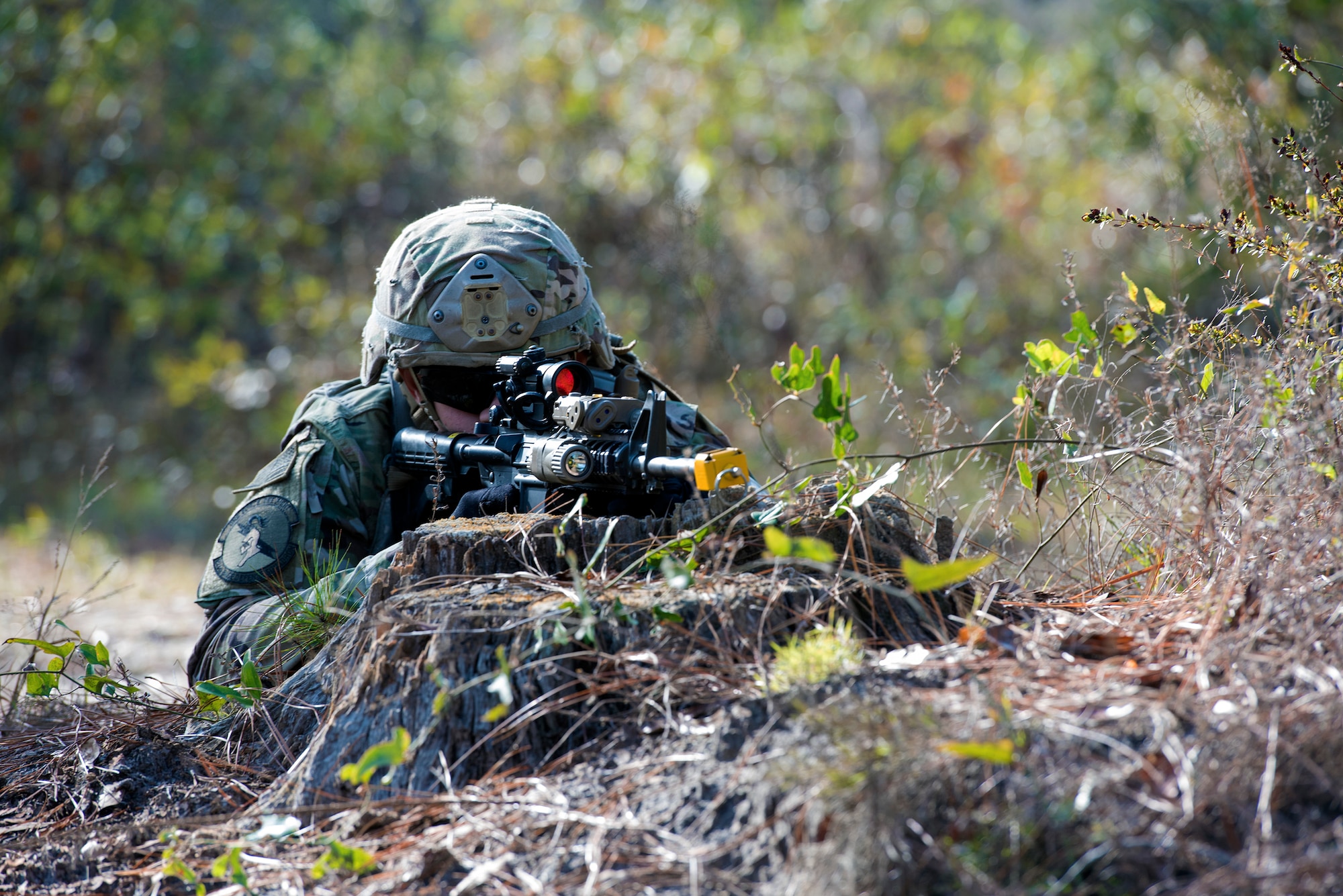 Airman 1st Class Tyris Smith, 824th Base Defense Squadron fire team member, scans the area for potential threats during dismount training, Dec. 8, 2016, at Moody Air Force Base, Ga. The 824th BDS is one of three squadrons in the 820th Base Defense Group, which is the only global ‘first-in’ force protection unit in the Air Force. (U.S. Air Force photo by Airman 1st Class Greg Nash)