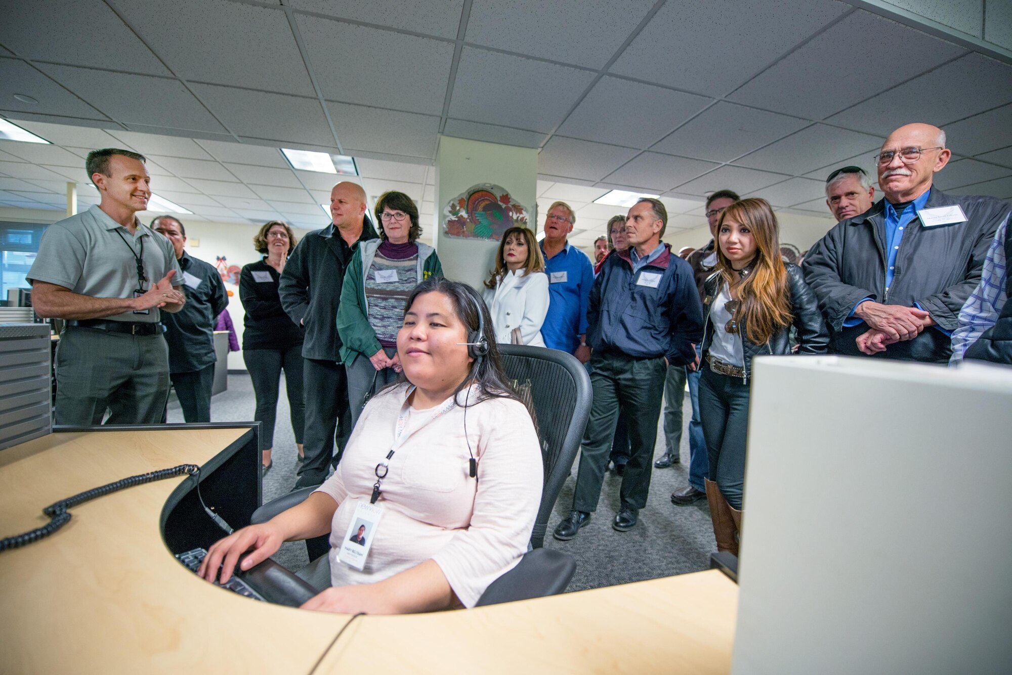 Mary Beltran, 60th Communications Squadron, demonstrates the voice recognition software to honorary commanders during their tour of the 60th Mission Support Group, Dec. 2, 2016. The purpose of the Travis Honorary Commander Program is to promote relationships between base senior leadership and civilian partners, foster civic appreciation of the Air Force mission and its Airmen, maximize opportunities to share the Air Force story with new stewards, and communicate mutual interest, challenges, and concerns that senior leaders and civilian stakeholders have in common. (U.S. Air Force photo/Louis Briscese)