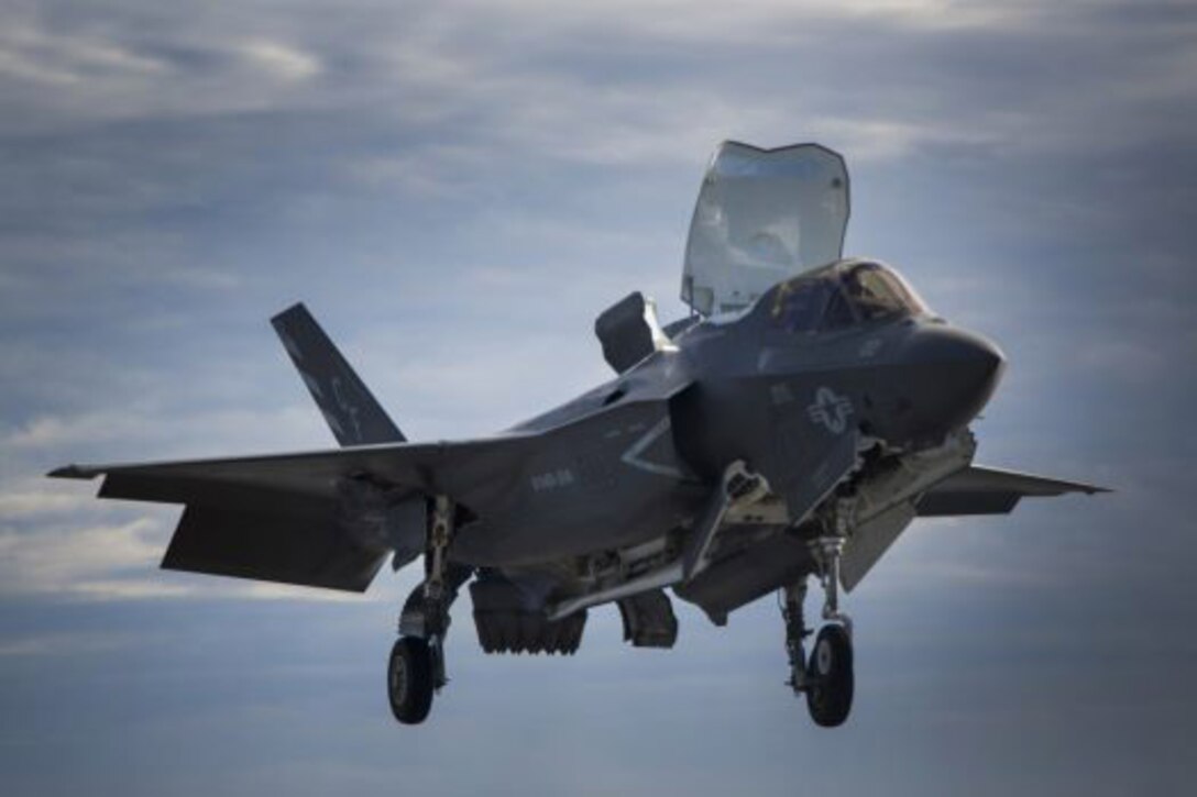 An F-35B Lightning II lands on the flight deck of the amphibious assault ship USS America in the Pacific Ocean, Nov. 18, 2016. Marine Corps Photo by Lance Cpl. Dana Beesley