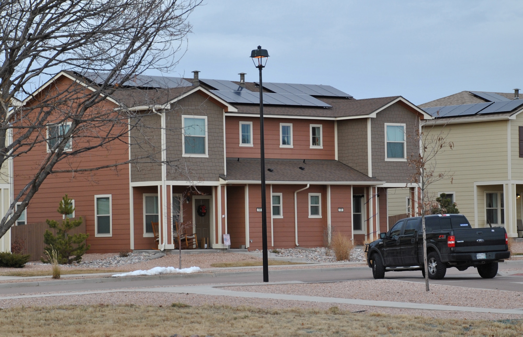 Housing at Peterson Air Force Base, Colorado, features rooftop solar panels. The homes are part of the Air Force Housing Privatization program portfolio. The Air Force Civil Engineer Center manages the program. (U.S. Air Force photo/Carole Chiles Fuller)