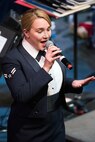 U.S. Air Force Airman 1st Class Stephanie Allen, U.S. Air Force Band of the Golden West vocalist, sings during her performance at the Veteran’s Home in Yountville, Calif., Dec. 5, 2016. The concert was part of the band’s annual holiday concert series. This year the band performed six shows over six days at five venues entertaining more than 10,000 people. (U.S. Air Force photo/Louis Briscese)