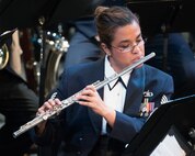 U.S. Air Force Staff Sgt. Melissa Rocha, U.S. Air Force Band of the Golden West flutist, performs during a holiday concert at the Veteran’s Home in Yountville, Calif., Dec. 5, 2016. The performance was part of the band’s annual holiday concert series. This year the band performed six shows in six days at five venues entertaining more than 10,000 people. (U.S. Air Force photo/Louis Briscese)