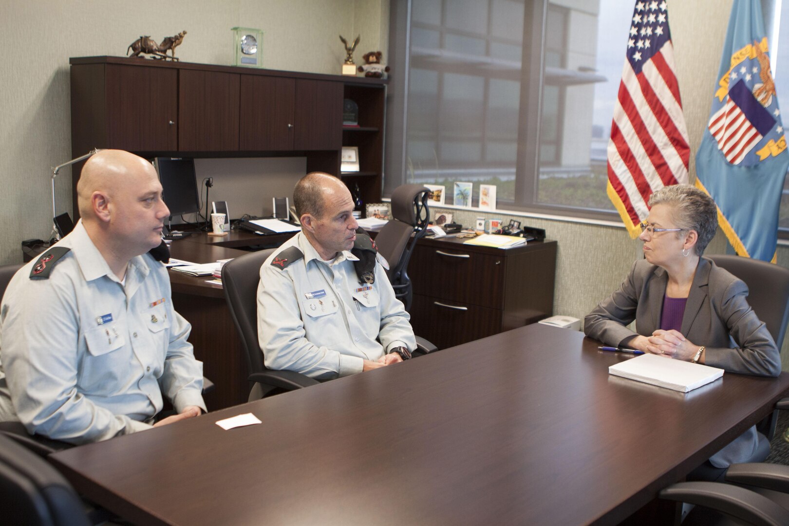 Ms. Twila Gonzales, SES, deputy commander of DLA Distribution, meets with BG Sokul, Israel Defense Forces and staff on December 6.