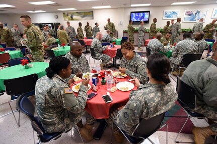 Army Reserve Soldiers assigned to the 85th Support Command come together for a holiday luncheon at the command headquarters during their December battle assembly, Dec. 4, 2016.
(Photo by Sgt. Aaron Berogan)