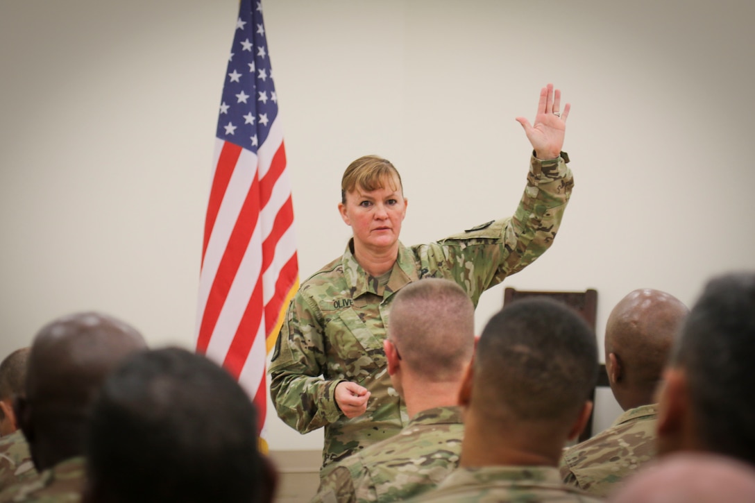 Brig. Gen. Nikki Griffin-Olive, deputy commanding general of sustainment, 335th Signal Command (Theater), welcomes home nearly 70 Army Reserve Soldiers from Detachment 10, 335th SC (T) during a Welcome Home Warrior ceremony at the North Fort Hood Chapel Dec. 11.  The Soldiers spent the past nine months deployed to Kuwait engineering, installing, operating, maintaining and defending network operations in support of Operations Freedom Sentinel and Spartan Shield.