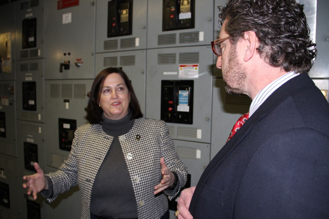 The Honorable Katherine Hammack, Assistant Secretary of the Army for Installations, Energy & Environment discussed infrastructure upgrades including aging transformer technology (background) with Deputy Director Lance Hansen, Ph.D., during her visit to the U.S. Army Engineer Research and Development Center's Cold Regions Research and Engineering Laboratory in Hanover, New Hampshire December 12. ASA Hammack’s visit included an overview of current and future projects and a working, R&D lunch with some of CRREL’s newest researchers.