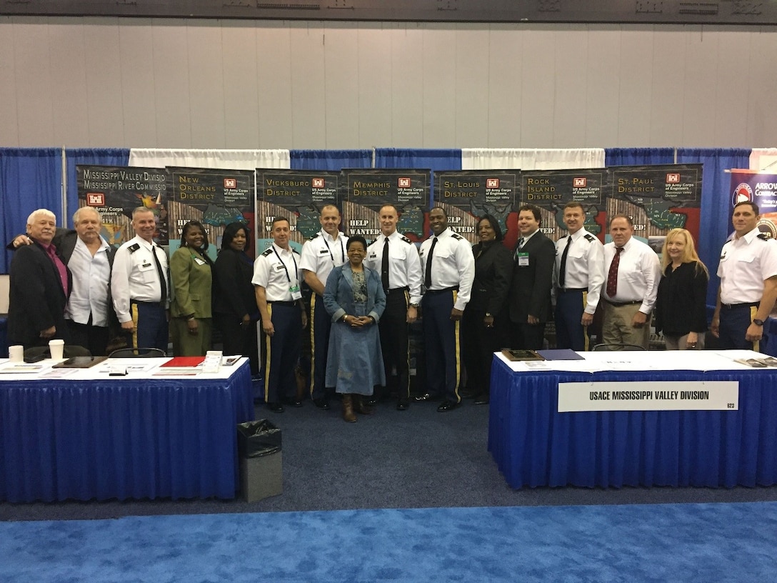 During the SAME Small Business Conference in November, District Commanders and MVD employees gathered to share the Division’s small business success stories and award winning programs. Pictured  left to right are: MVN Small Business Specialist David Willis, MVN Small Business Chief Michael Bloom, MVN Commander Col. Mike Clancy, MVN Contracting Chief, Eileen Darby, MVK Small Business Chief Demetric Erwin, MVK Commander Col. Mike Derosier, MVM Commander Col. Mike Ellicott, MVD Small Business Asst. Director Marlan Snodgrass, MVD Commander Maj. Gen. Mike Wehr, MVS Commander Col. Anthony Mitchell, MVS Contracting Chief Brenda Wynne George, MVS Deputy for Program & Project Management John Peukert, MVR Commander Col. Craig Baumgartner, MVR Small Business Chief Scott Shelley, MVP Small Business Chief Kim Ramsay, and MVP Commander Col. Sam Calkins. The conference was held in Atlanta, Georgia.
