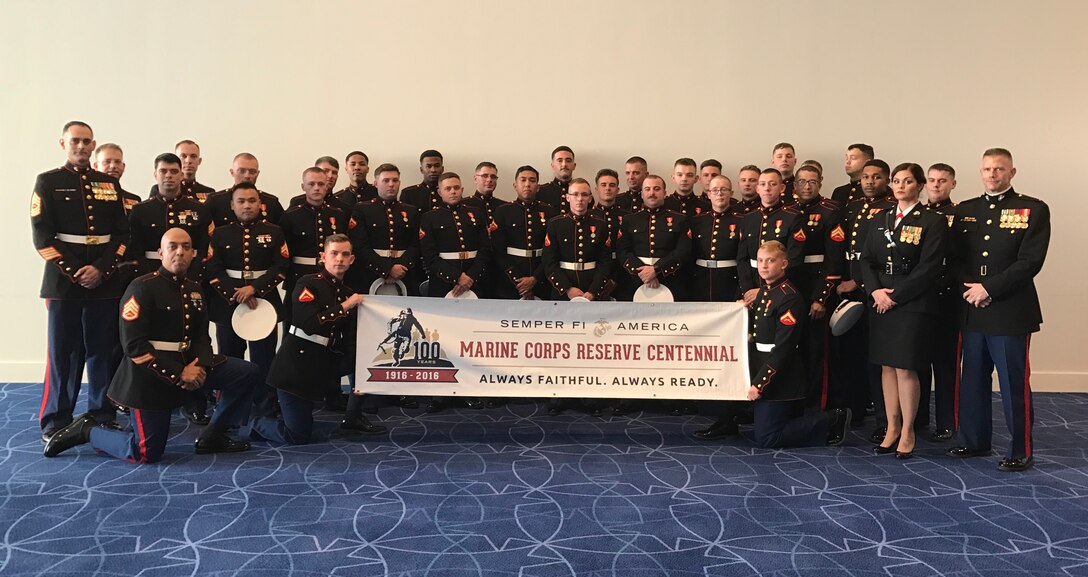 Marines from Detachment 4, Combat Logistics Regiment 45, Combat Logistics Battalion 451, 4th Marine Logistics Group, pose with the Marine Corps Reserve Centennial banner in Greensboro, N.C., Nov. 19, 2016. Today, approximately 500 Reserve Marines are providing fully integrated operational support to Fleet and Combatant Commanders around the world. For more information on the history and heritage of Marine Forces Reserve as well as current Marine Corps stories and upcoming Centennial events, please visit www.marines.mil/usmcr100.