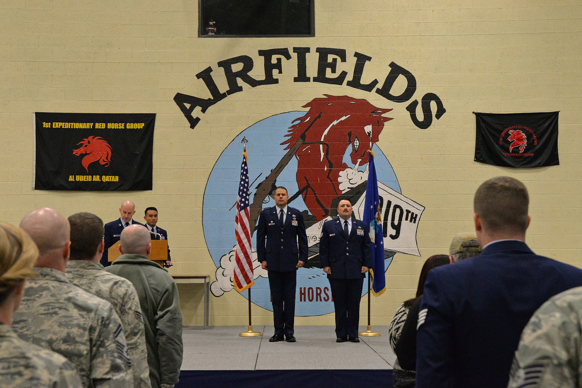 Staff Sgt. Joseph Dickison, 819th RED HORSE Squadron heating, ventilation and air conditioning technician, right, is awarded a Purple Heart medal during a ceremony at the Air Fields Hangar Dec. 9, 2016, at Malmstrom Air Force Base, Mont. Dickison was awarded the Purple Heart for combat wounds received in Afghanistan in July 2009. (U.S. Air Force photo/Airman 1st Class Daniel Brosam)
