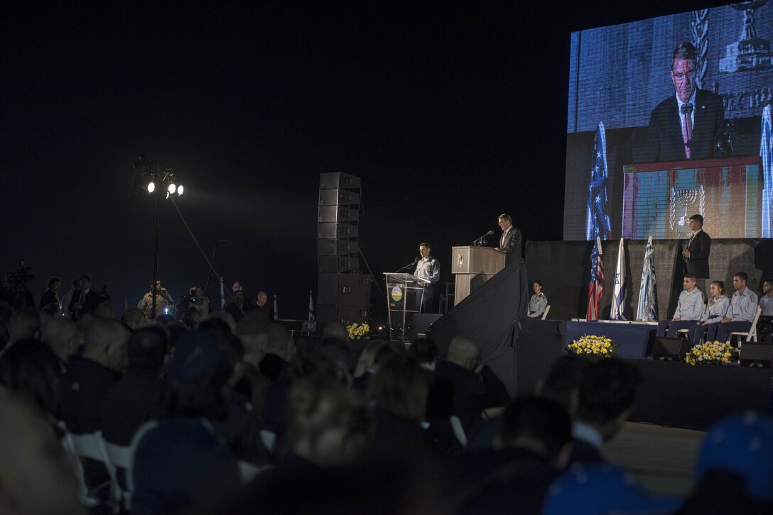 Defense Secretary Ash Carter speaks during a ceremony marking Israel's receipt of two F-35A Lightning II fighter jets at Nevatim Air Base, Israel, Dec. 12, 2016. 