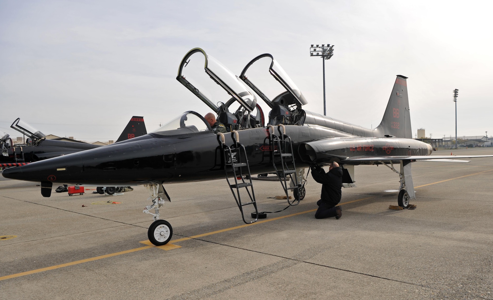 Matt Miller, 9th Maintenance Group T-38 aircraft mechanic, begins inspecting a T-38 Talon after a sortie Dec. 5, 2016, at Beale Air Force Base, California. The mechanics’ efforts allow pilots to fly between 12 and 15 sorties a day. (U.S. Air Force Photo/Airman Tristan D. Viglianco)