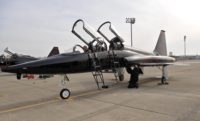 Matt Miller, a 9th Maintenance Group T-38 aircraft mechanic, begins inspecting a T-38 Talon after a sortie Dec. 5, 2016, at Beale Air Force Base, Calif. The mechanics’ efforts allow pilots to fly between 12 and 15 sorties a day. (U.S. Air Force Photo/Airman Tristan D. Viglianco)