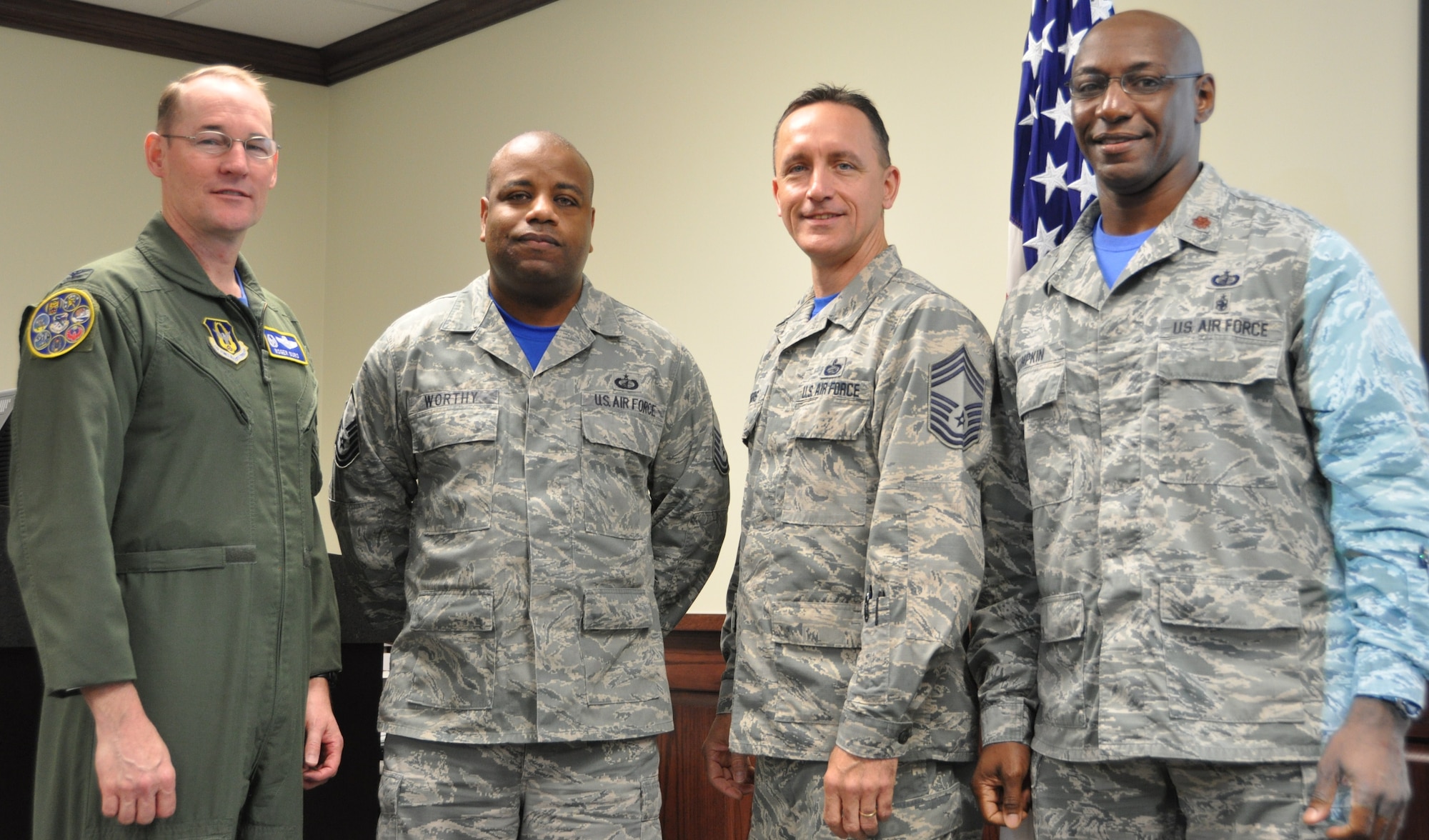 Master Sgt. Derrick Worthy (2nd from left) Stands with Col. Roger Suro, 340th FTG commander, Maj. Thallas Lumpkin, 340th FTG comptroller and group superintendent, Chief Master Sgt. Jimmie Morris during the group’s Dec. 1 MUTA at Joint Base San Antonio-Randolph, Texas  to commemorate his  receipt of Department of Defense certification in financial management during the group’s Dec. 1 MUTA at Joint Base San Antonio-Randolph, Texas (Photo by Janis El Shabazz).