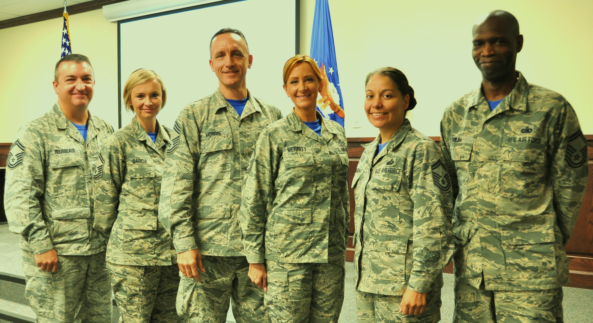 Chief Master Sgt. Jimmie Morris, 340th FTG  group superintendent (center) stands with Senior Master Sgts. (L to R) Jon Rousseaux, Laura Garcia, Laura Merritt, Michele Cartagena and Kwame Tawiah during the Group's MUTA held Dec. 1-2 at Joint Base San Antonio-Randolph, Texas as 340 FTG commander, Col. Roger Suro recognizes them for the leadership and mentorship they provide to the junior enlisted Airmen (Photo by Janis El Shabazz).

