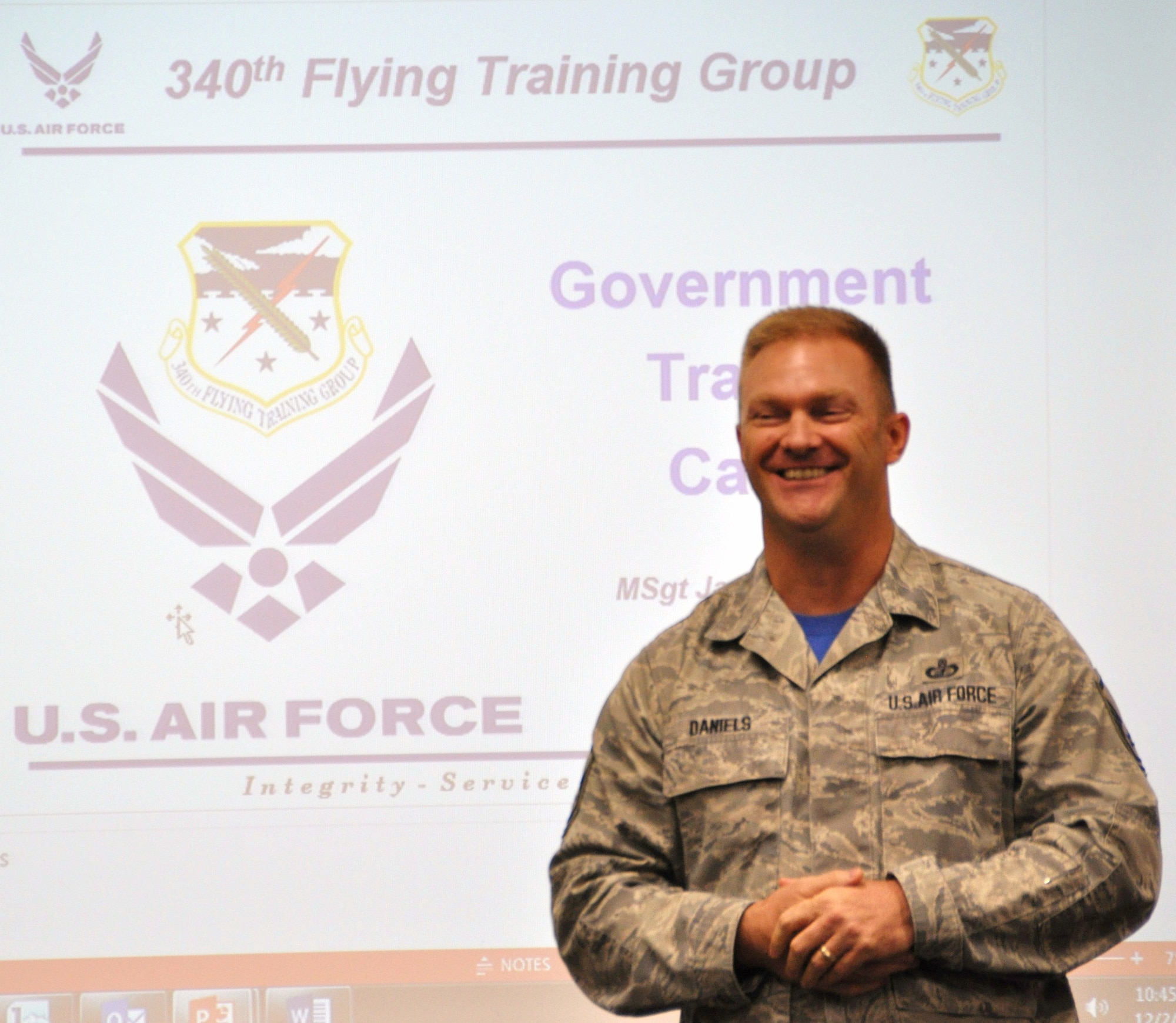 Master Sgt. Jason Daniels presents a brief on the government travel card during the 340th Flying Training Group's MUTA held Dec. 1-2  at Joint Base San Antonio-Randolph, Texas (Photo by Janis El Shabazz).