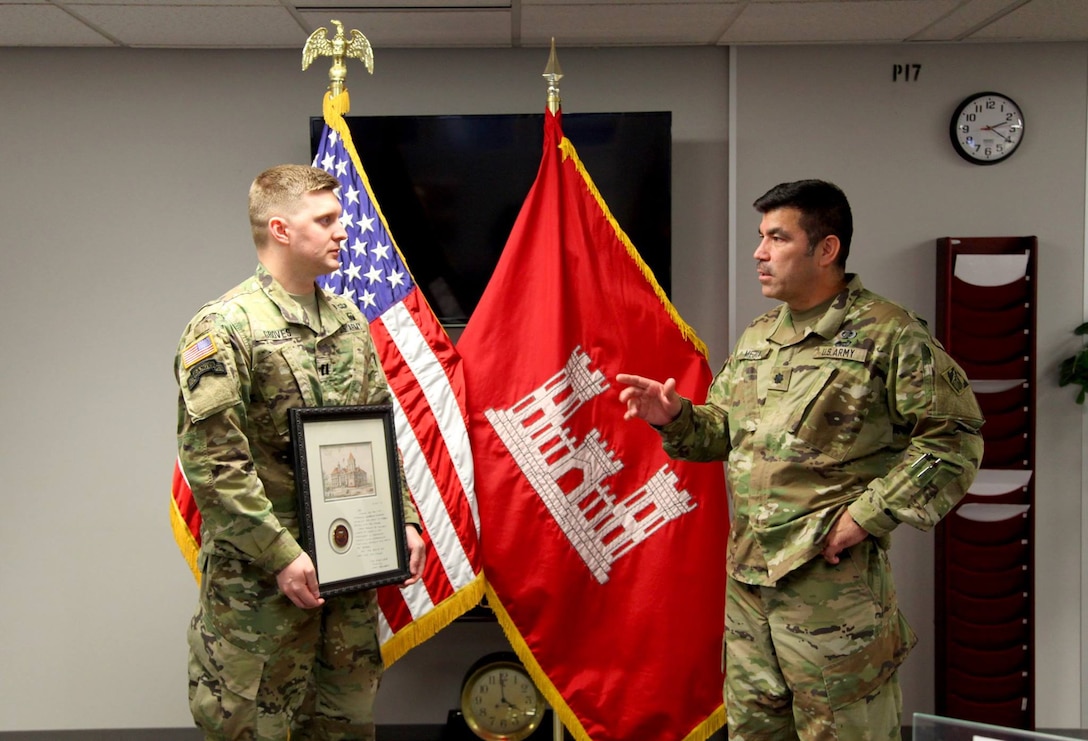 Lt. Col. Juan Mejia, St. Louis District Deputy District engineer presented Capt. Joel Groves, Project engineer with the St. Louis District an award for his leadership and dedication in mentoring U.S. Army Cadets and ROTC students interested in Science, Technology, Engineering and Mathematics (STEM). Lt. Col. Mejia presented the award n behalf of Mississippi Valley Division Commander Maj. Gen. Michael Wehr, in November.

STEM education plays a critical role in supporting the Defense Department and the Army in the security of the Nation and enables the United States to remain an economic and technological leader. STEM fields are growing rapidly: the U.S. expects 2.8 million STEM job openings by 2020 based on growth and retirements.
