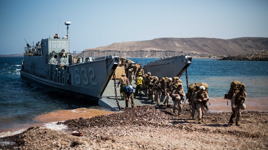 U.S. 5TH FLEET AREA OF OPERATIONS (Dec. 8, 2016) Marines with Company C, Battalion Landing Team 1st Bn., 4th Marines, 11th Marine Expeditionary Unit (MEU), offload from a Landing Craft Utility to participate in Exercise Alligator Dagger, Dec. 8. The LCU can carry approximately 350 Marines or 170 tons of cargo or vehicles from ship to shore. While present in the region, the Makin Island Amphibious Ready Group and 11th MEU provide U.S. Naval Forces Central Command with a flexible, sea-based military force, readily
available to respond to emerging crises and support a wide-range of military operations. 
