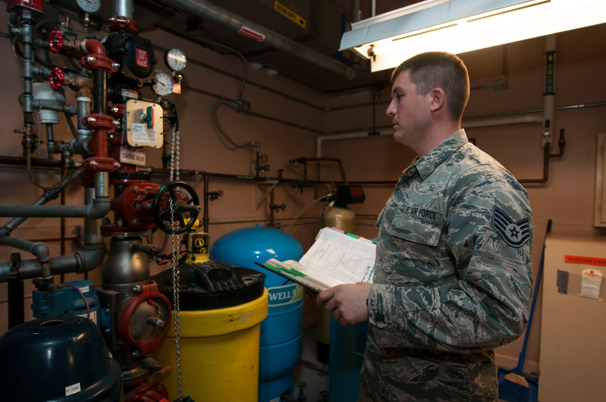 Staff Sgt. Benjamin Cestoni, 320th Missile Squadron facility manager, inspects the missile alert facility water pressure system in the F.E. Warren missile complex in Wyoming, Nov. 5, 2016. FMs are charged with ensuring the missile alert facility functions properly by performing daily inspections on the various systems and restocking items like linen and food. (U.S. Air Force photo by Staff Sgt. Christopher Ruano)
