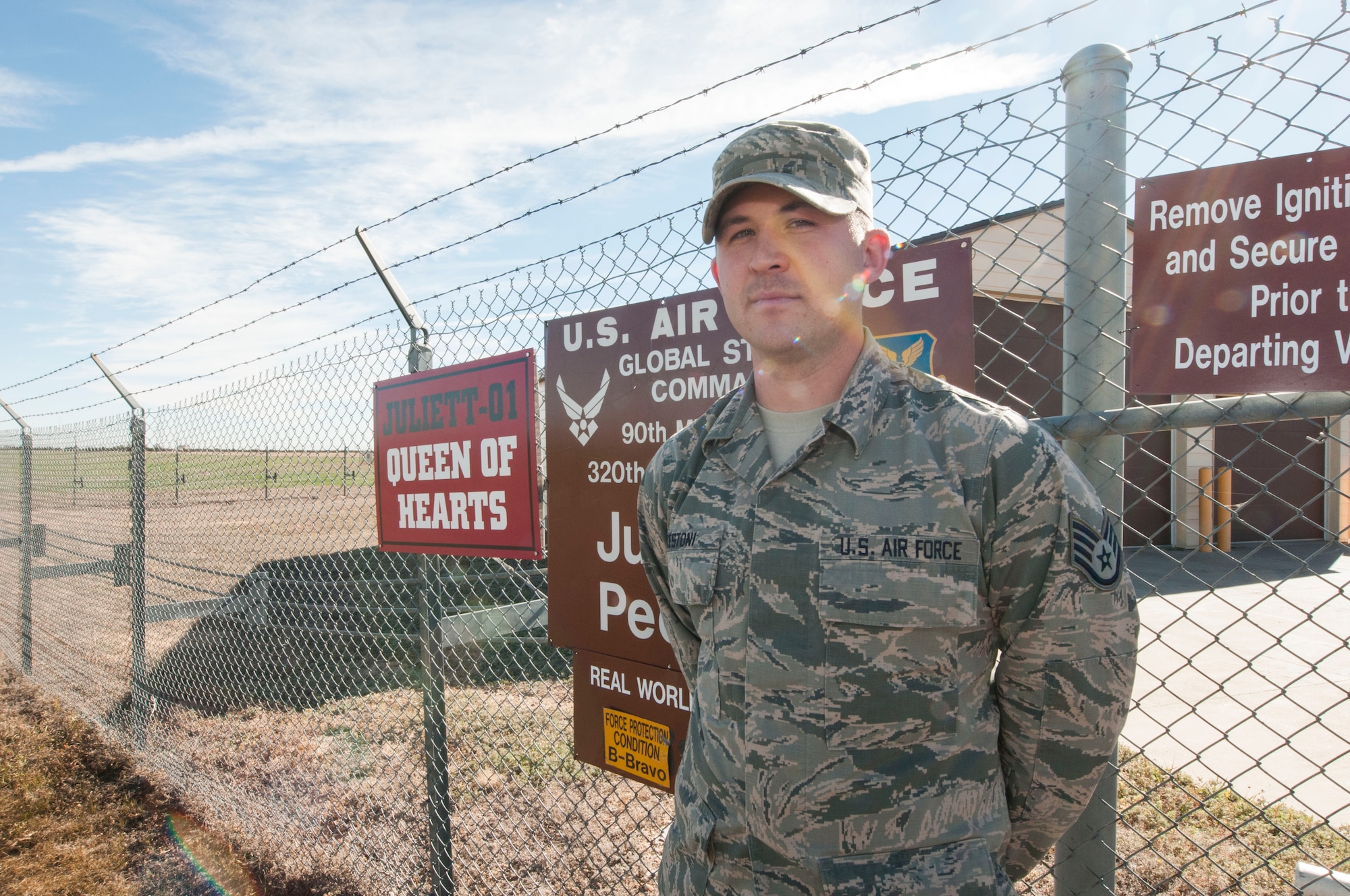 Staff Sgt. Benjamin Cestoni, 320th Missile Squadron facility manager, stands in front of a missile alert facility in the F.E. Warren missile complex in Wyoming, Nov. 5, 2016. The FM position is a four year special duty tour that is open to staff sergeant selects through master sergeant. (U.S. Air Force photo by Staff Sgt. Christopher Ruano)