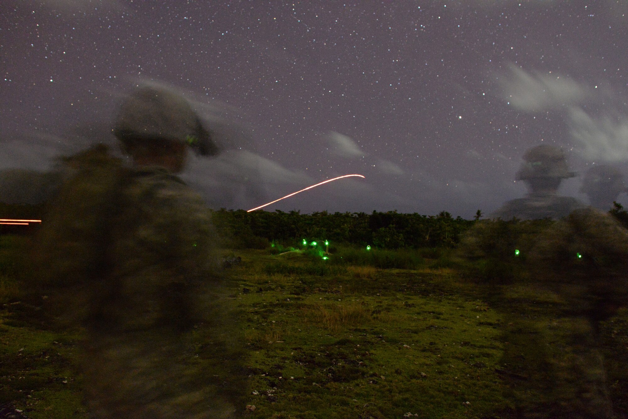 A U.S. Army squad from Alpha Company, 4th Battalion, 23rd Infantry Regiment, 2nd Stryker Brigade Combat Team, 2nd Infantry Division eliminates simulated targets during a night time squad live-fire exercise Nov. 18, 2016, at Andersen Air Force Base, Guam. After executing their objective during daylight hours, squads repeated the scenario using infrared lasers to mark their targets in the dark to gain experience working in low-light situations. (U.S. Air Force photo by Airman 1st Class Jacob Skovo)