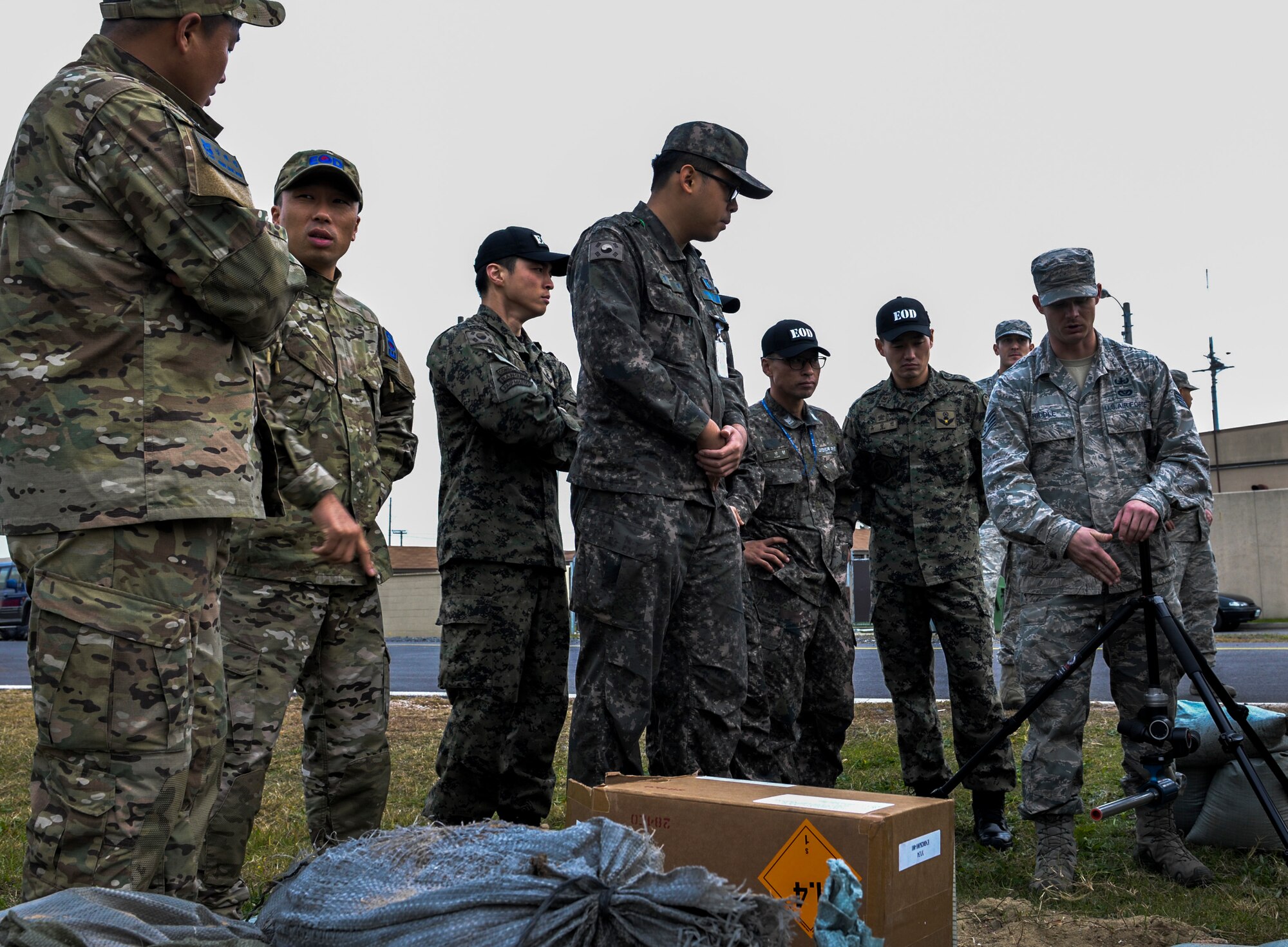 U.S. Air Force Staff Sgt. William Riddle, 8th Civil Engineer Squadron explosive ordnance disposal technician, teaches different ways of disposing ordnance to Republic of Korea Air Force EOD members at Kunsan Air Base, Republic of Korea, Nov. 7, 2016. This training increases U.S. and ROK interoperability and ultimately enhances U.S. and ROK commitments to maintain peace in the region. (U.S. Air Force photo by Senior Airman Colville McFee/Released)
