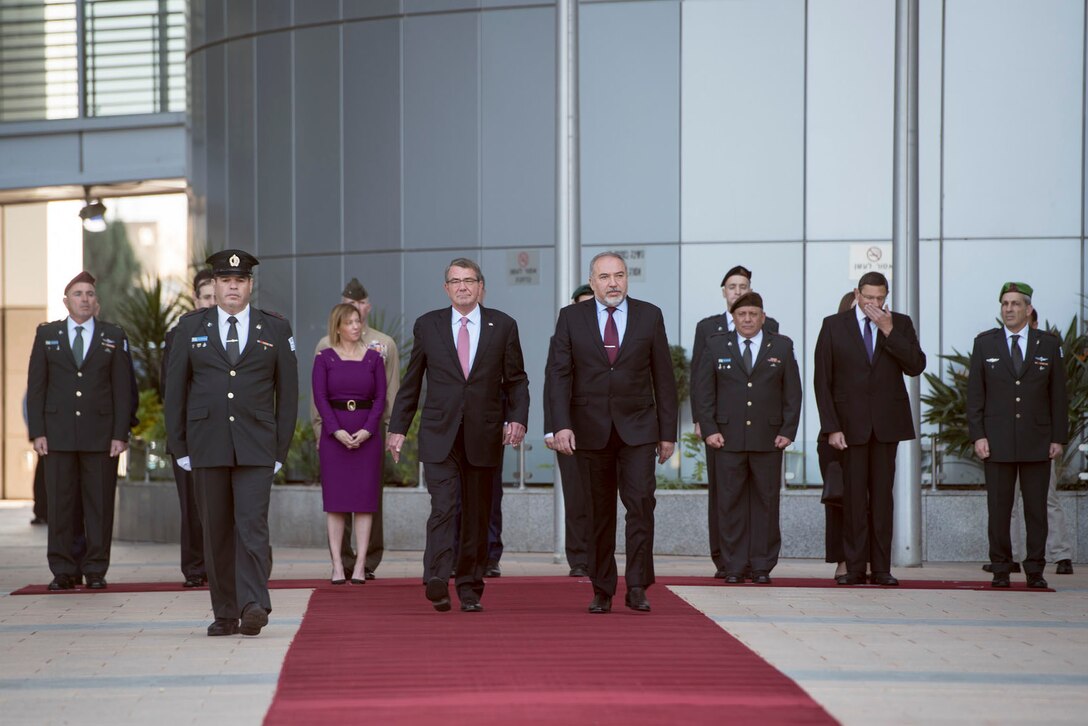 Defense Secretary Ash Carter walks with Israeli Defense Minister Avigdor Lieberman to observe an honor guard in Tel Aviv, Israel, Dec. 12, 2016. DoD photo by Air Force Tech. Sgt. Brigitte N. Brantley