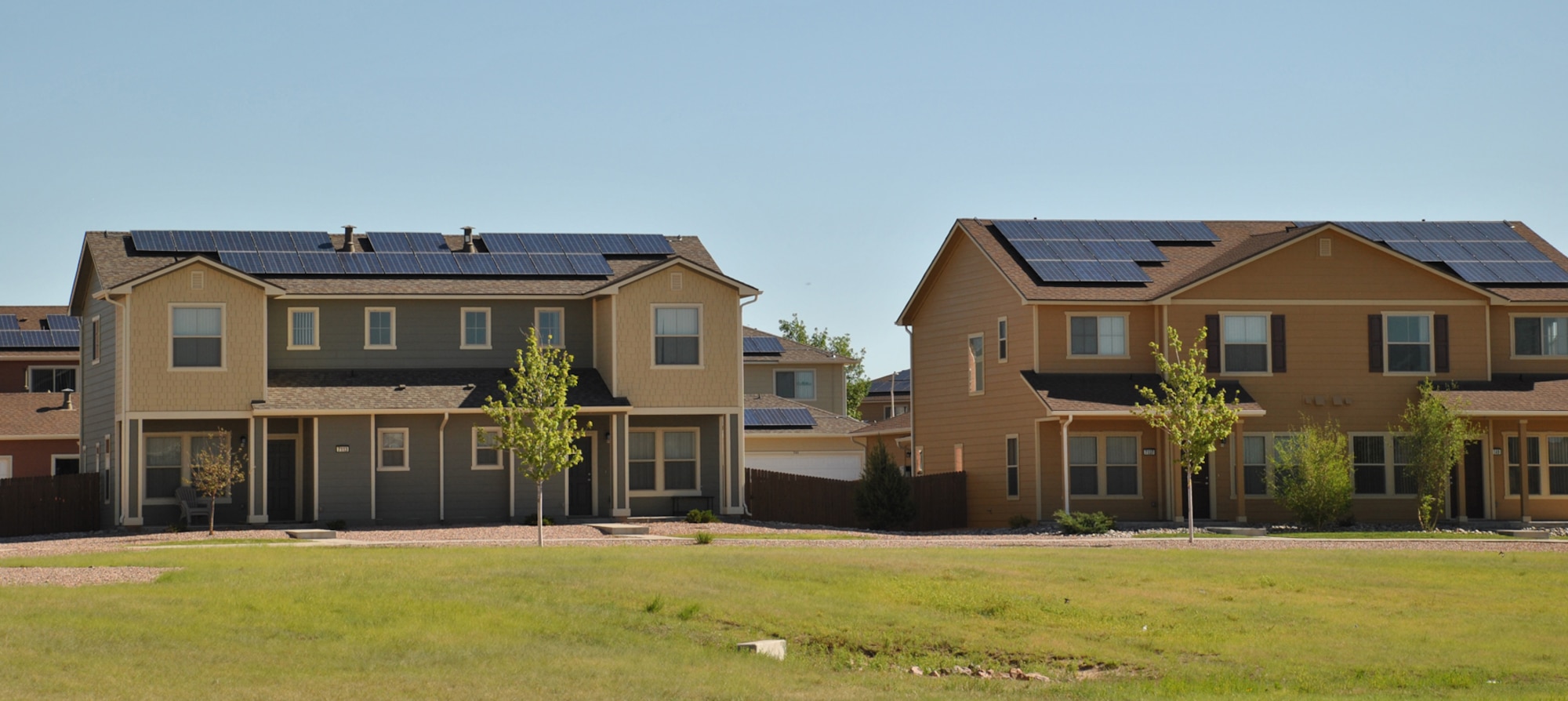 Duplex housing at Peterson Air Force Base, Colorado, features rooftop solar panels. The homes are part of the Air Force Housing Privatization program portfolio, which is managed by the Air Force Civil Engineer Center. (U.S. Air Force photo/Carole Chiles Fuller)