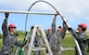 U.S. Air Force and Japan Air Self-Defense Force Airmen assemble frames during Silver Flag Dec. 5, 2016, at Northwest Field, Guam. U.S. Pacific Command’s partner nation Silver Flag training classes are held to promote mutual understanding between partner nations and PACAF civil engineers' missions, capabilities and objectives. (U.S. Air Force photo by Senior Airman Arielle K. Vasquez/Released)