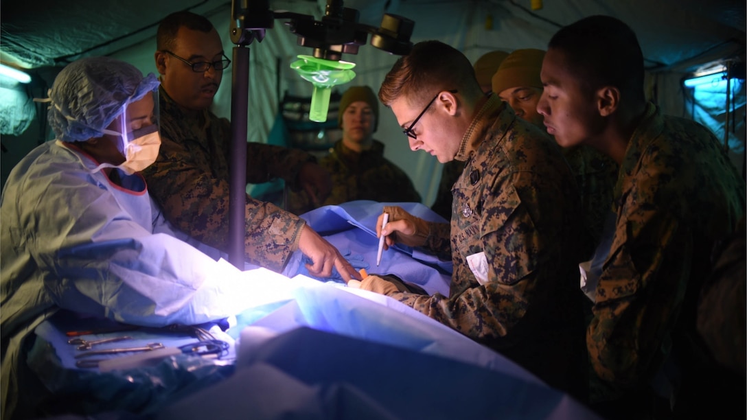 Sailors practice medical skills during Winter Workhorse 16 in the Republic of Korea Dec. 12, 2016. Winter Workhorse is an annual exercise designed to train Marines and sailors to carry out mission essential tasks in a simulated forward-deployed environment. The Sailors are with 3rd Medical Battalion, 3rd Marine Logistics Group, III Marine Expeditionary Force.