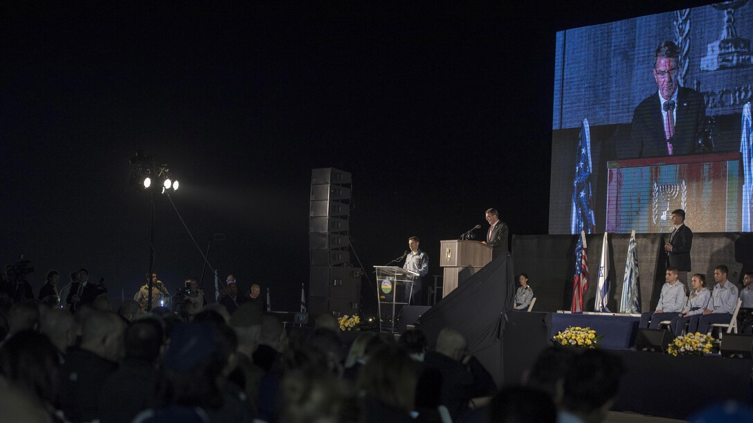 Defense Secretary Ash Carter speaks during a ceremony in Israel marking the arrival of two F-35 fighter jets from the United States. Carter is on an around-the-world trip to advance DoD priorities.