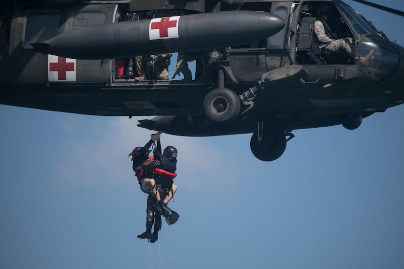 An HH-60 Pave Hawk helicopter assigned to Joint Task Force-Bravo’s 1st Battalion, 228th Aviation Regiment, provided airlift support for a team of special forces troops performing air assault training during Operation Serpiente, a joint training mission led by members of the U.S. 7th Special Forces Group and Naval Special Warfare, Dec. 1, Lake Ilopango, El Salvador.