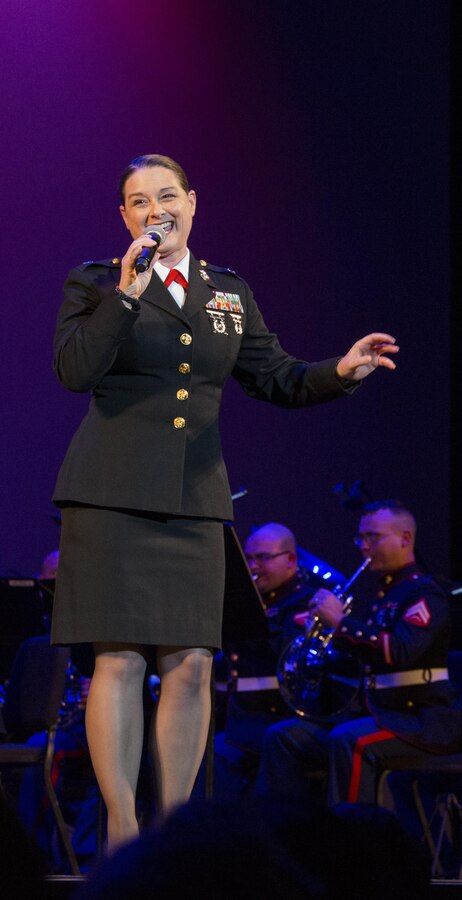 Lieutenant Colonel Tanya M. Murnock, assistant chief of staff for public affairs, performs “All I Want for Christmas is You” at the Marine Corps Band New Orleans “Santa Meets Sousa” holiday concert at Saenger Theatre, Dec. 10, 2016. The performance was the third in the regional concert series that served to benefit the U.S. Marine Corps Reserve Toys for Tots Program. Toys for Tots is a nationwide program that collects new, unwrapped toys for less-fortunate children in the community. Since its inception in 1947, Toys for Tots has distributed 512 million toys to 237 million children.