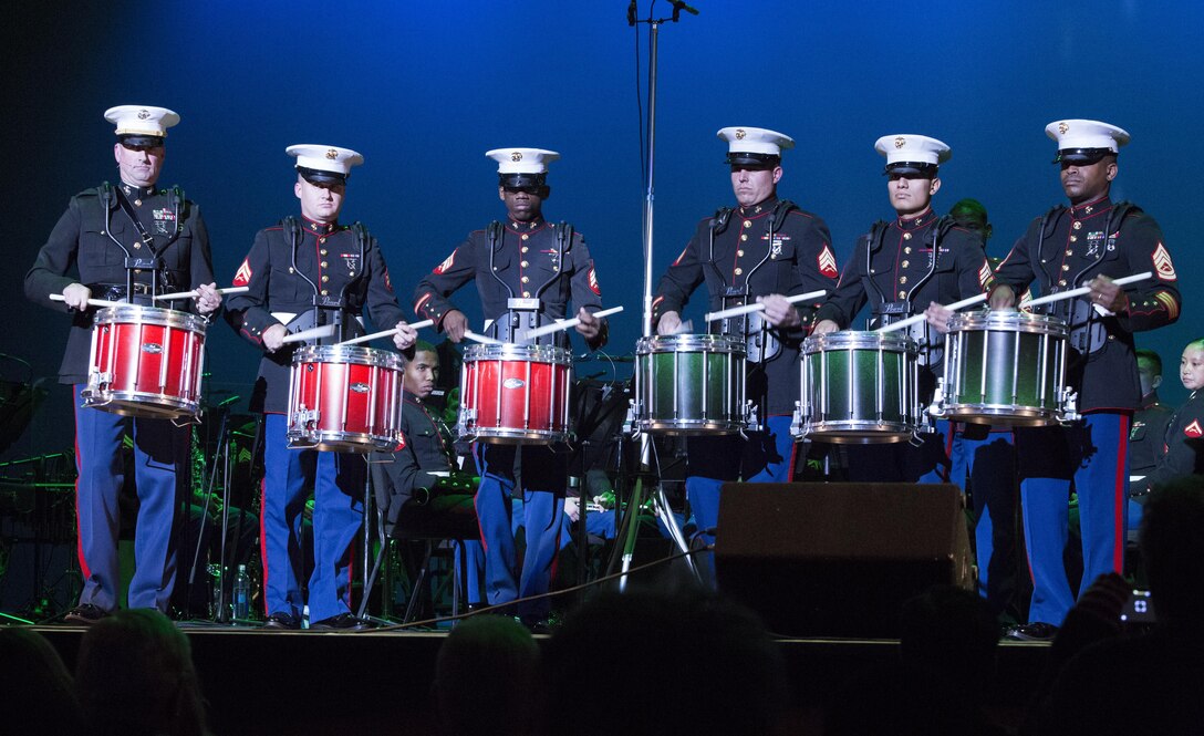 Marines with Marine Corps Band New Orleans finish the “Santa Meets Sousa” holiday concert with a drum line at Saenger Theatre, Dec. 10, 2016 for the U.S. Marine Corps Reserve Toys for Tots program. The performance was the third in the regional concert series that served to benefit the U.S. Marine Corps Reserve Toys for Tots Program. Toys for Tots is a nationwide program that collects new, unwrapped toys for less-fortunate children in the community. Since its inception in 1947, Toys for Tots has distributed 512 million toys to 237 million children.