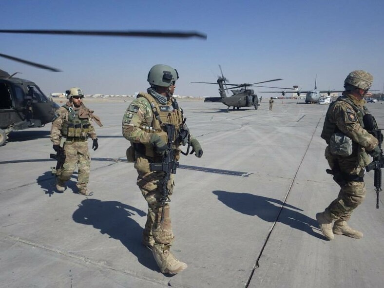 Special Agent Robert Binns, Air Force Office of Special Investigations Detachment 531 superintendent, exits a helicopter in Afghanistan during his deployment from 2012-2013. Binns and his AFOSI team in Afghanistan received the large detachment-of-the-year award and Binns received the Bronze Star Medal. (Courtesy photo)