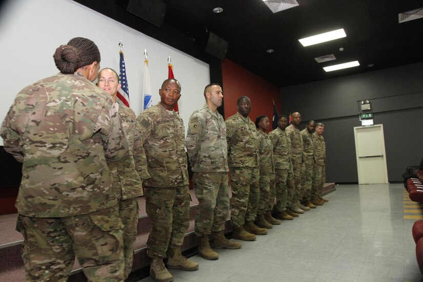 A select group of Soldiers from the 1st Human Resources Sustainment Center received a coin during the ceremony from Sgt. Maj. Annette C. Townsend, senior enlisted advisor of the 14th HRSC, 1st Theater Sustainment Command-Operational Command Post, Dec. 6, 2016 at Camp As Sayliyah, Qatar. The coin
was a token of appreciation for assisting and guiding the Soldiers of the 14th HRSC as they transitioned into their roles in the theater of operations.