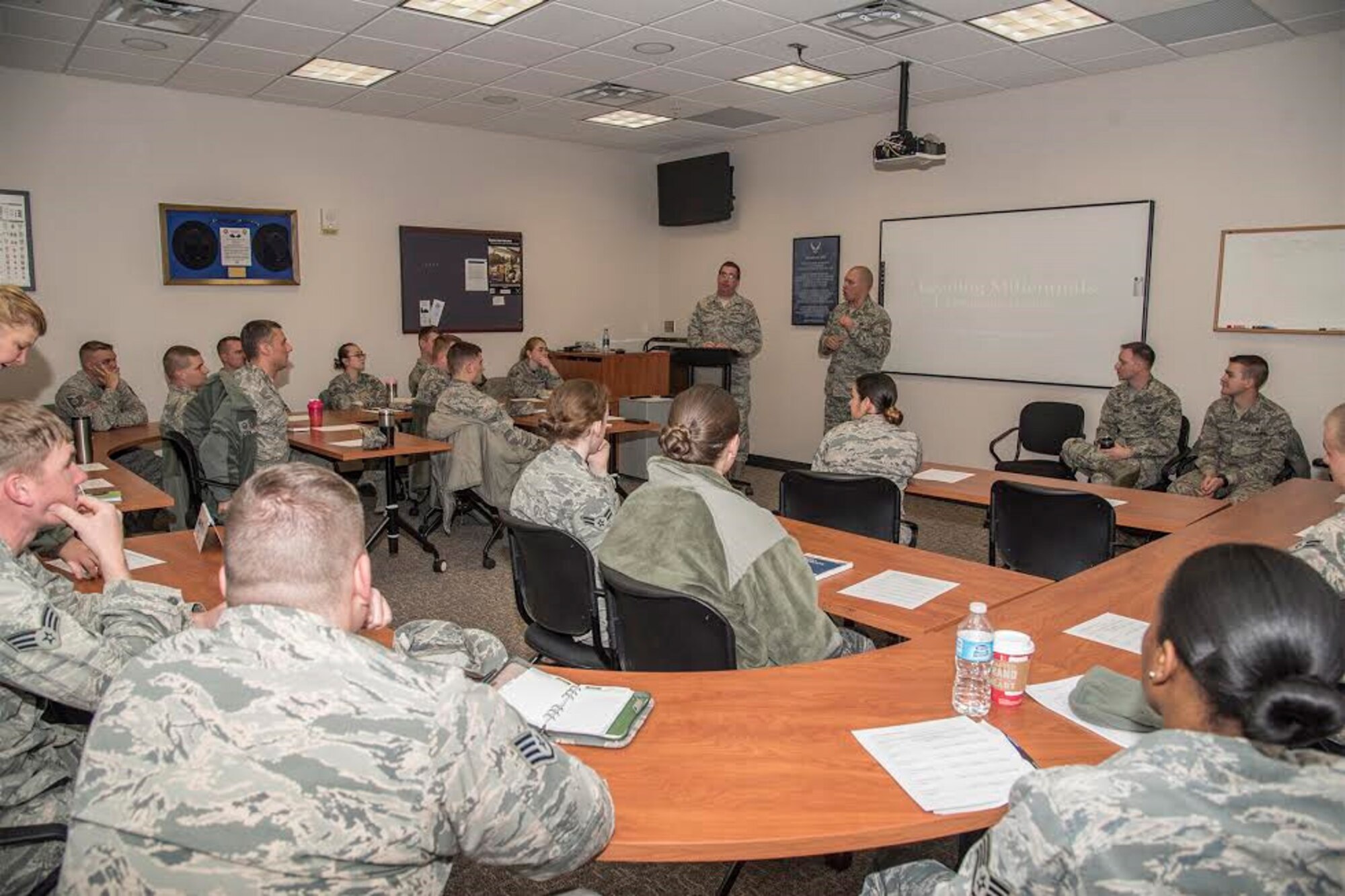 PETERSON AIR FORCE BASE, Colo. – Master Sgt. Matthew Heenan, 21st Force Support Squadron career assistance advisor, welcomes attendees to the Millennial Leadership Course, Dec. 9, 2016, at the Professional Development Center on Peterson Air Force Base, Colo. The course was designed by Peterson’s 5/6 Club as a facilitated discussion group to provide guidance on how lead millennial Airmen and new generations entering the Air Force. (U.S. Air Force photo by Staff Sgt. Tiffany DeNault)