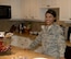 Staff Sgt. Isata Tucker, a manager on duty at the Fisher House for Families of the Fallen, on Dover Air Force Base, Del., manages the facility on Dec. 12, 2016, ensuring that the property is always ready for use. Staff Sgt. Tucker survived a war in her former country of Sierra Leone, Africa. She recieved her U.S. citizenship on the same day she graduated from Air Force Basic Military Training in 2013.