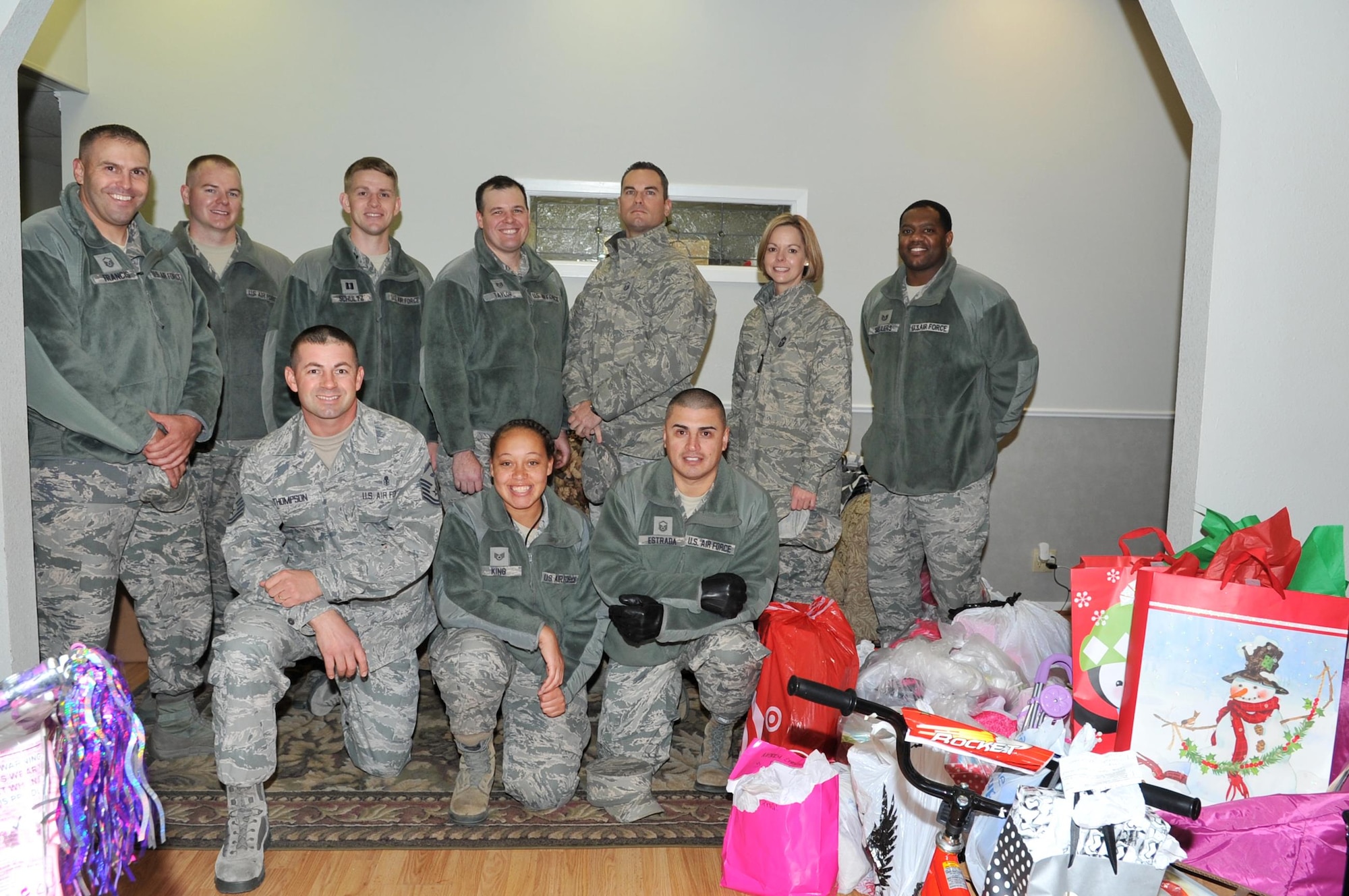 Goodfellow Air Force Base members after delivering toys to the Court Appointed Special Advocates for Children center, San Angelo, Texas, Dec. 8, 2016. Goodfellow members provided gifts for 340 children in emergency foster care. (U.S. Air Force photo by Staff Sgt. Laura R. McFarlane/Released)